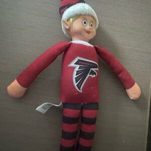 Falcons elf on a shelve